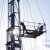 An operator standing on a platform of a workover rig, near Durango, Colorado USA