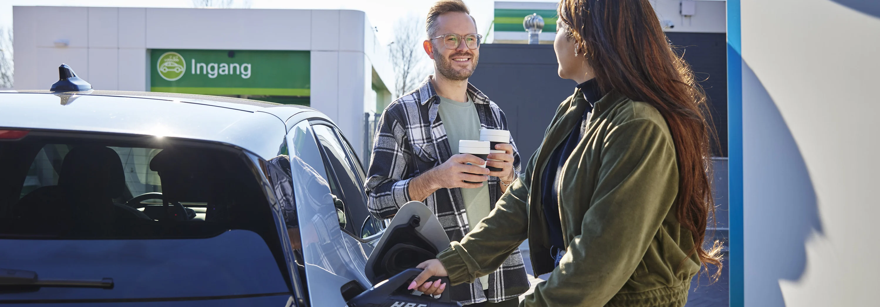 bp customers take a coffee break while charging their EV