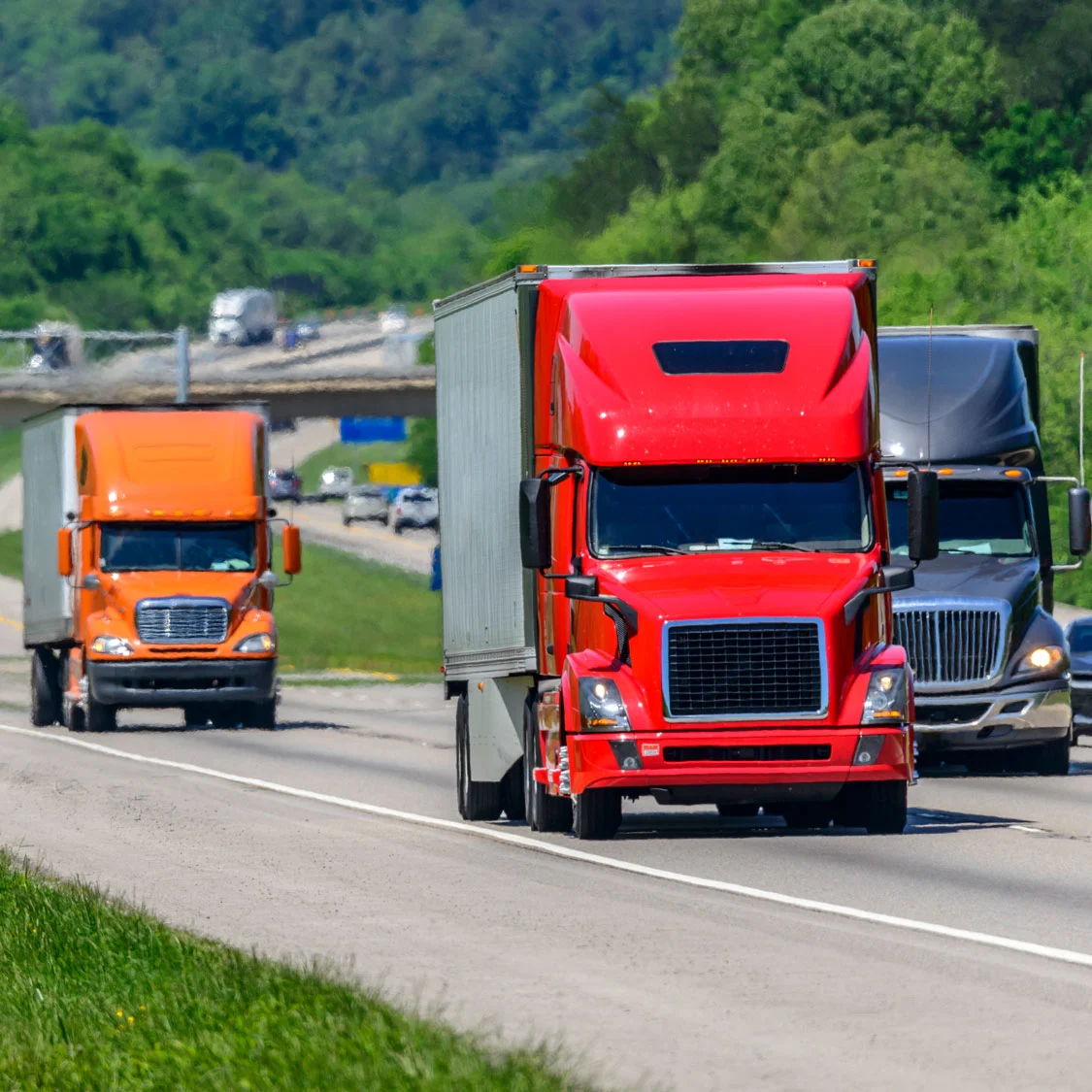 Heavy-duty trucks on a highway