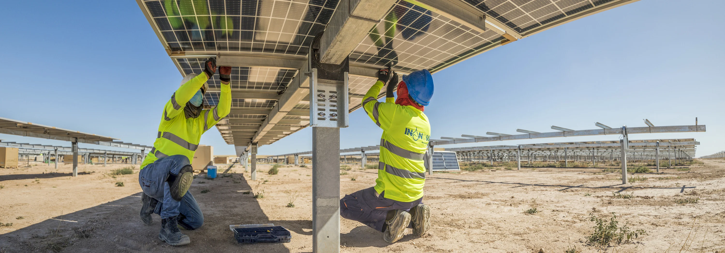 Lightsource bp workers install bifacial solar panels